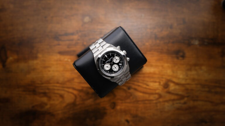 Vacheron Constantin Overseas Chronograph displayed on wooden surface