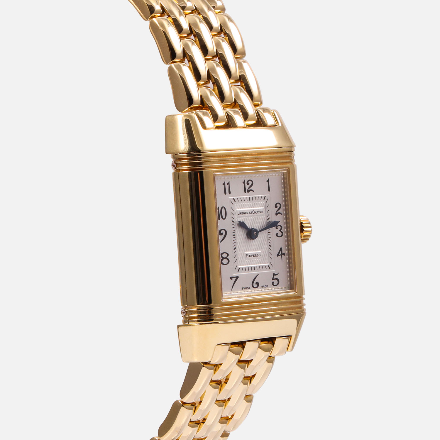 A pre-owned Jaeger-LeCoultre Reverso Duetto (Ref. 266.1.44) in 18k yellow gold featuring its iconic reversible case and a solid 18k yellow gold integrated link bracelet, side image.