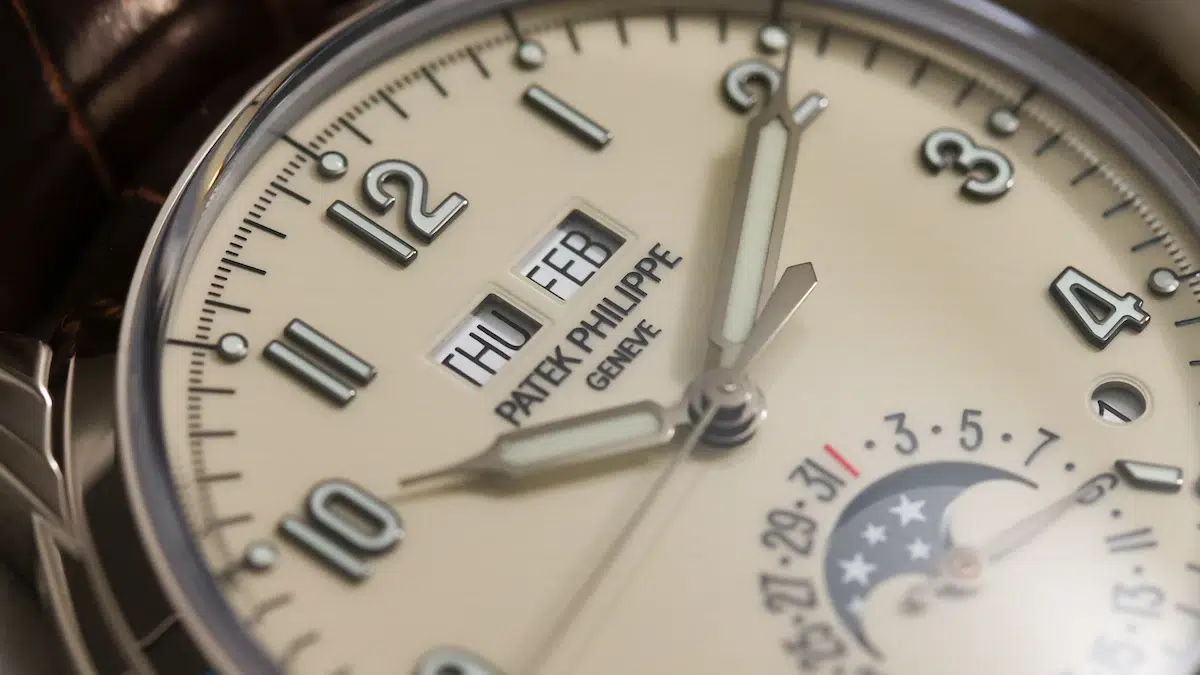 Patek Philippe 5320G-001 ivory lacquer dial with day and month apertures.