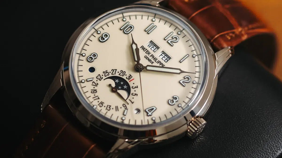 Patek Philippe 5320G-001 Perpetual Calendar displayed on leather watch case.