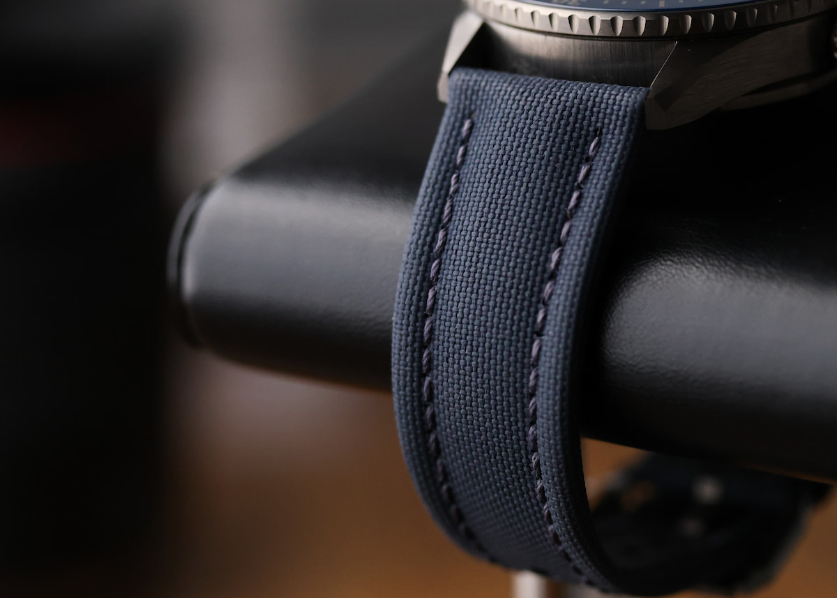 Blancpain Fifty Fathoms Bathyscaphe ceramic case and blue sailcloth strap detail