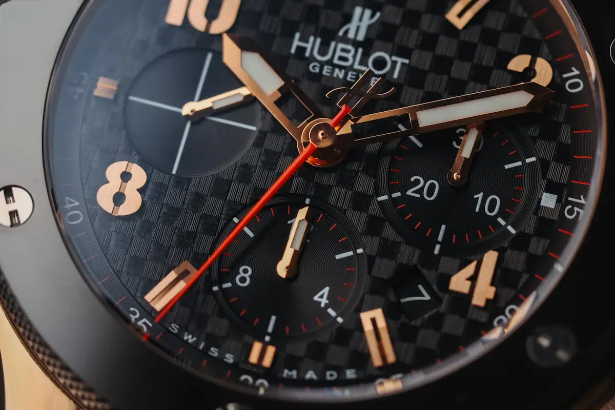 Close-up of the Hublot Big Bang Chronograph dial showing rose gold hands, applied numerals, and chronograph subdials