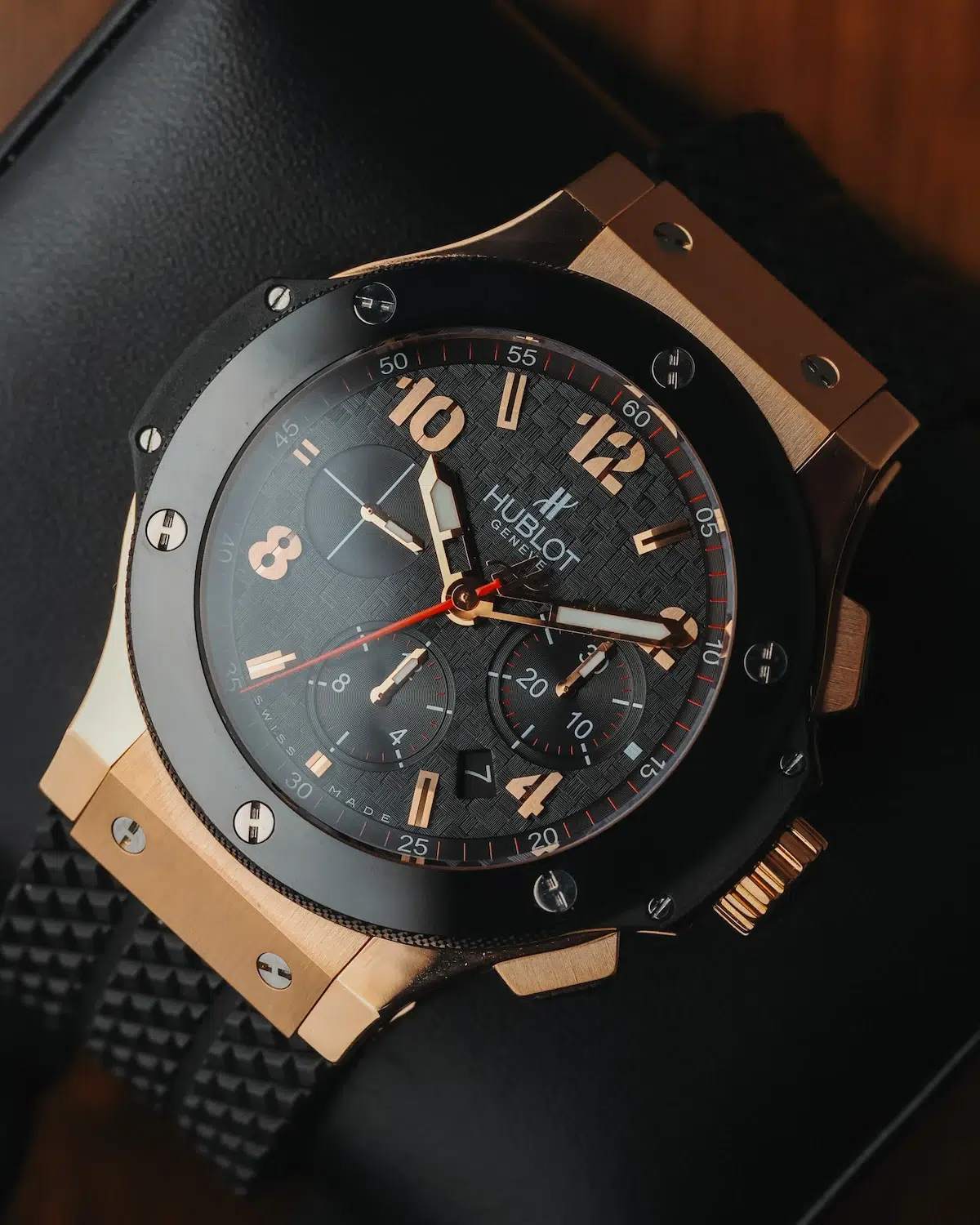 Front view of the Hublot Big Bang Chronograph 18K rose gold with black dial, rose gold numerals, and rubber strap