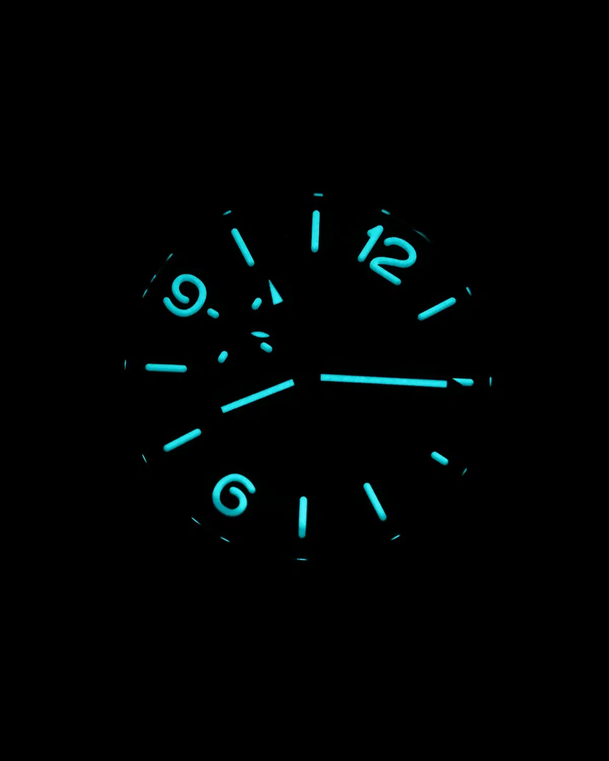 Lume shot of Panerai Luminor GMT Bucherer Blue PAM01176 glowing markers and hands