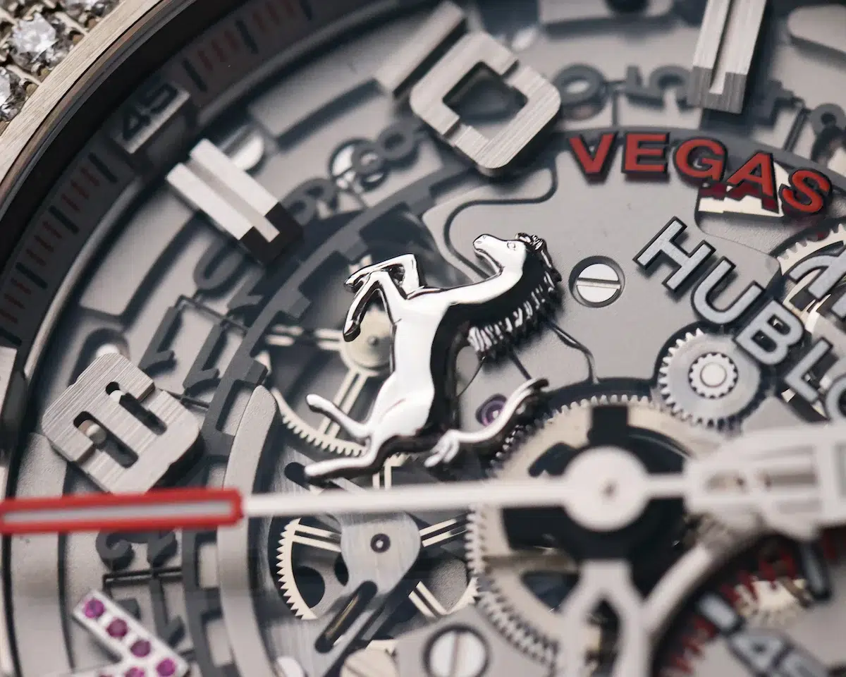Macro detail of Hublot Big Bang Ferrari Las Vegas dial showing Vegas text and movement components