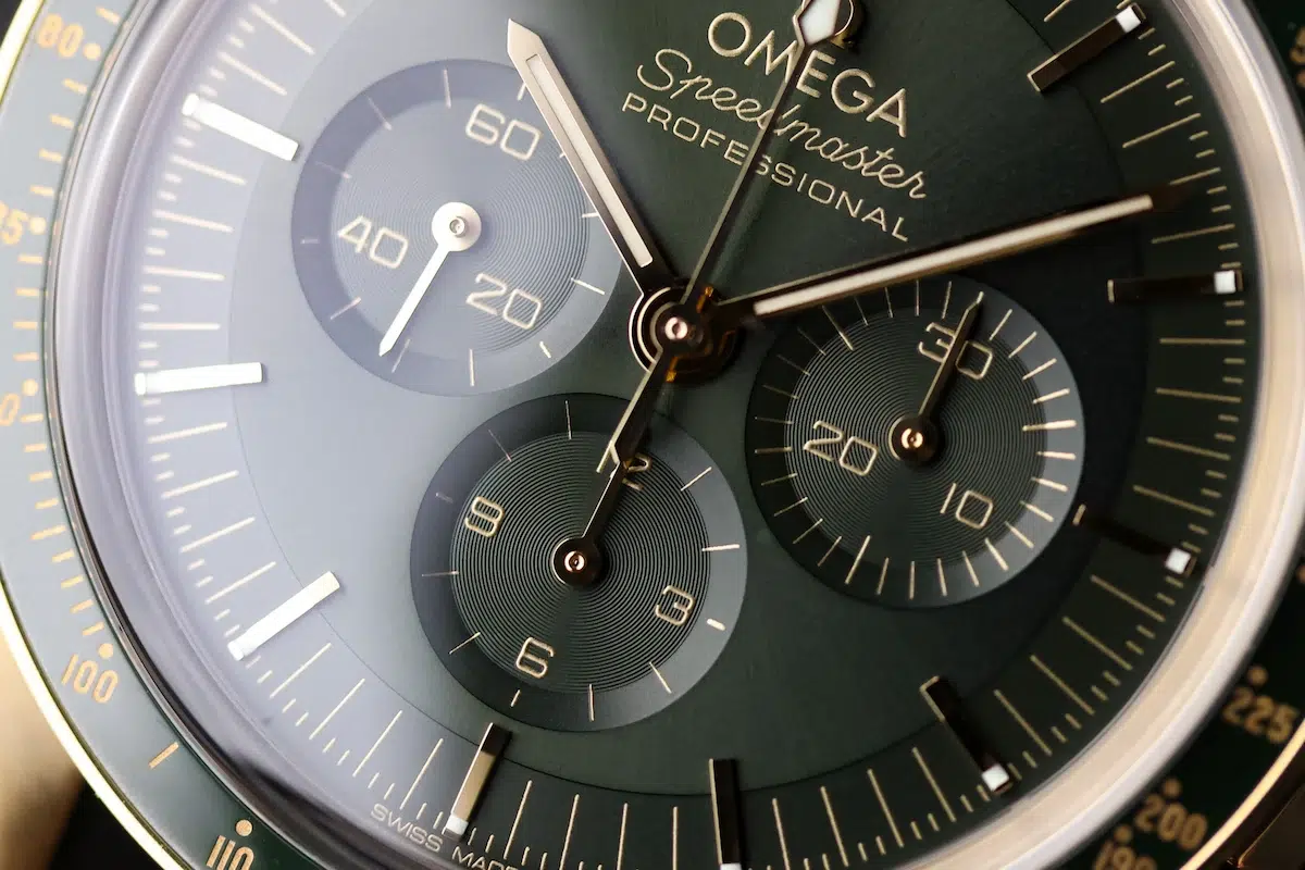 Macro shot of Omega Speedmaster Moonwatch Professional chronograph subdials and gold hands