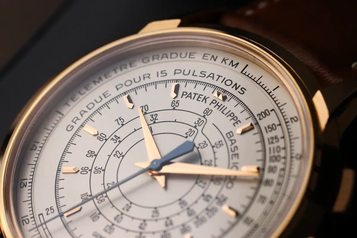 Macro shot of Patek Philippe 5975R-001 dial showing pulsometer, tachymeter, and telemeter scales