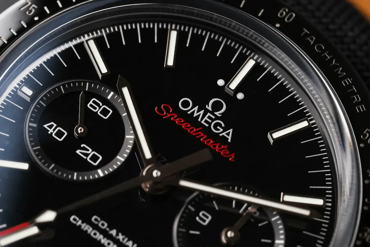 Omega Speedmaster Dark Side of the Moon dial detail with applied indices and chronograph subdials