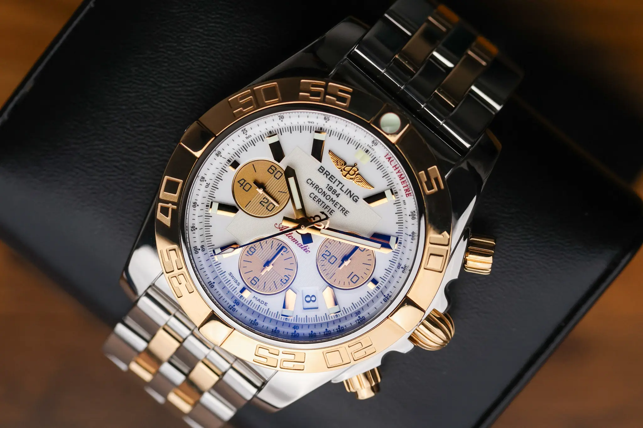 Breitling Chronomat 44mm CB011012A696 white dial on two-tone rose gold and stainless steel bracelet
