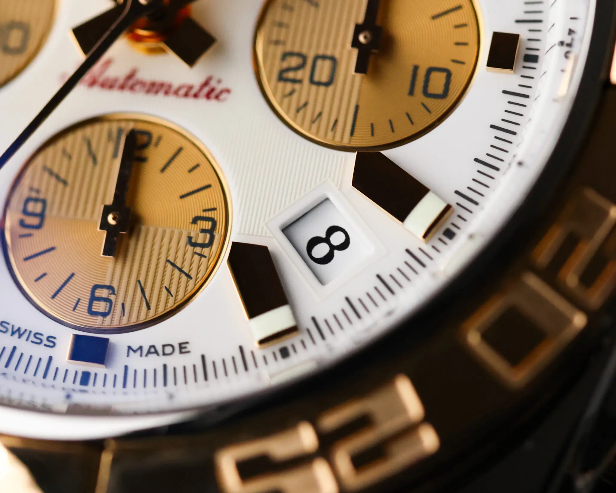 Detailed view of Breitling Chronomat 44mm chronograph registers and date window at 430