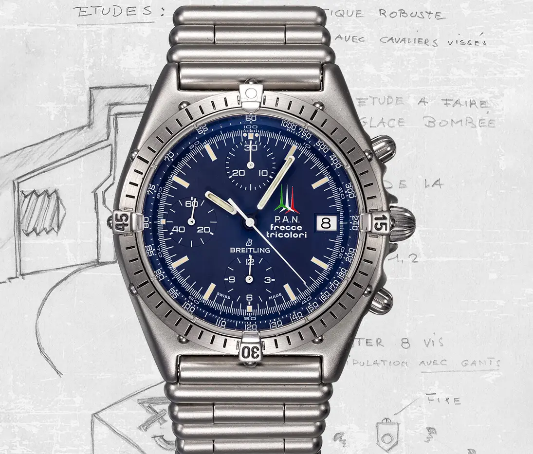 A vintage 1984 Breitling Chronomat "Frecce Tricolori" edition chronograph watch, featuring a stainless steel case, a black dial with three sub-dials, a chunky rotating bezel with gold rider tabs, and the Italian Air Force aerobatic team logo