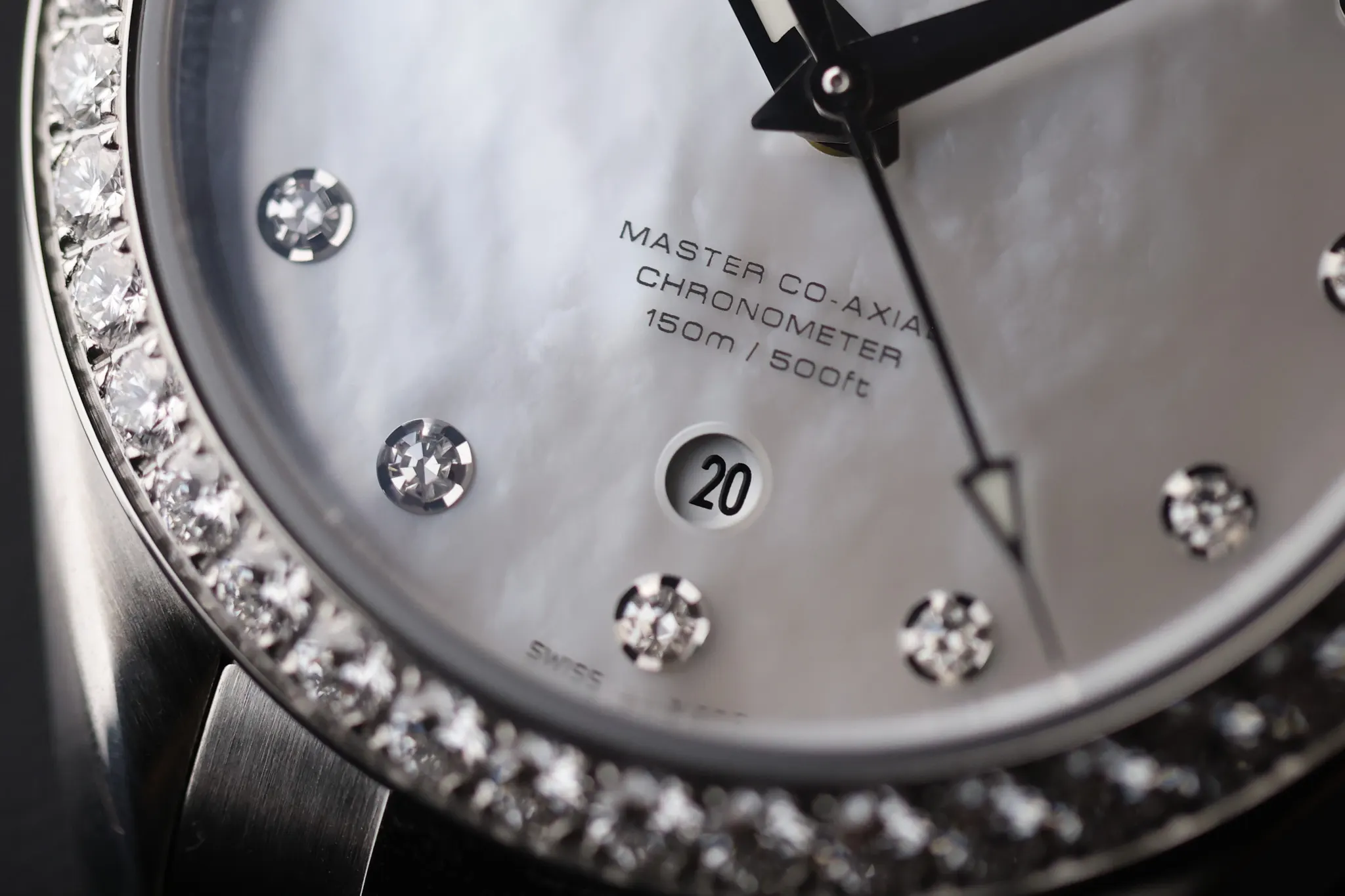 Side profile of Omega Seamaster Aqua Terra 150M showing diamond-set bezel and stainless steel case