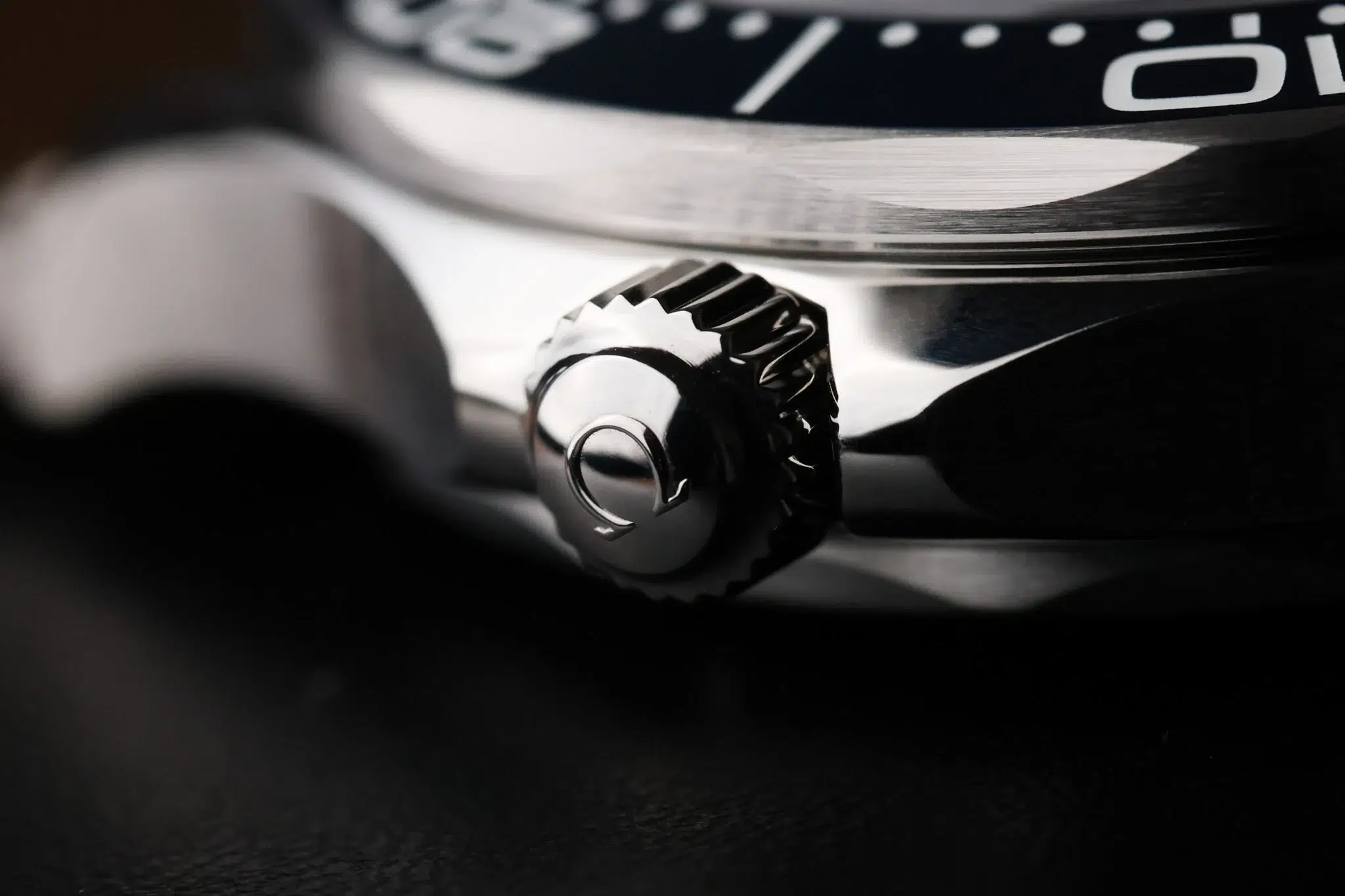 Side profile of Omega Seamaster James Bond 60th Anniversary showing crown and case finish