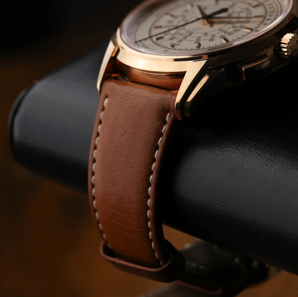 Side profile of Patek Philippe 5975R-001 rose-gold case brown leather strap