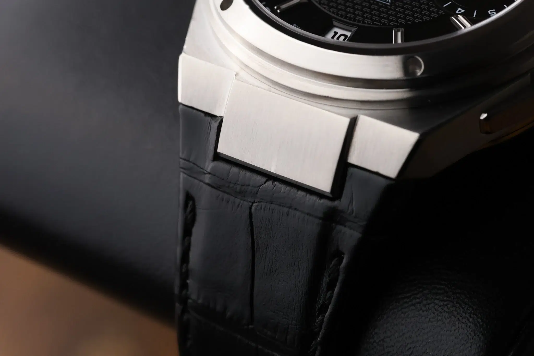Side view of IWC Big Ingenieur case and integrated black leather strap