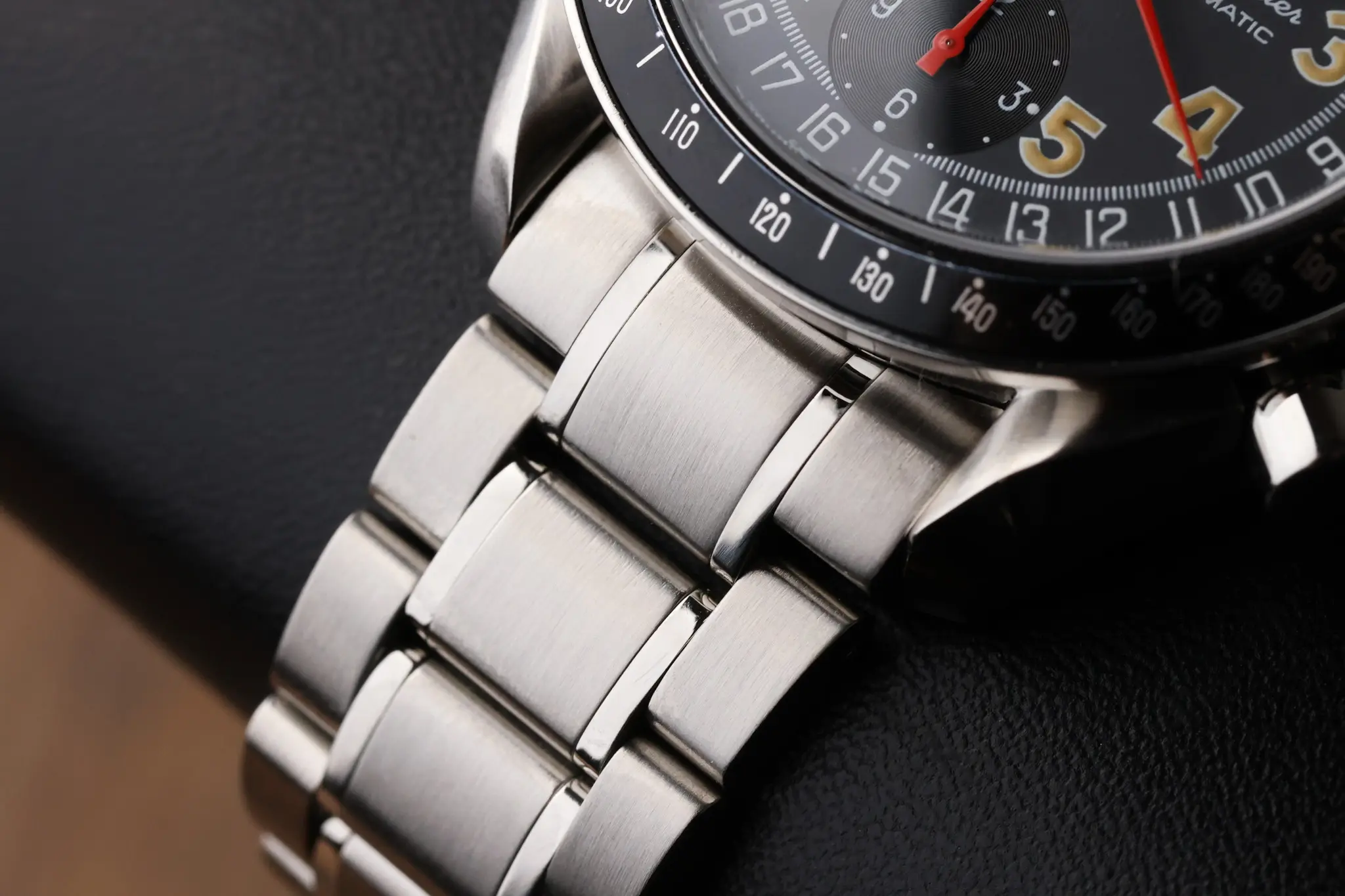 Stainless steel bracelet detail on the Omega Speedmaster Day Date 39mm