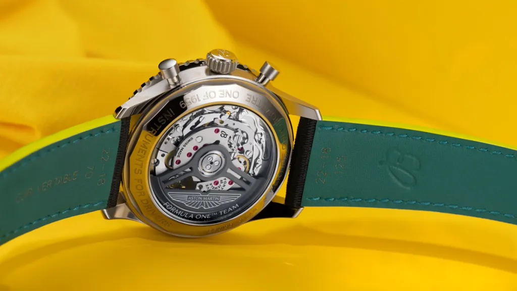 Navitimer B01 Chronograph 43 Aston Martin Aramco Formula ONE on yellow background
