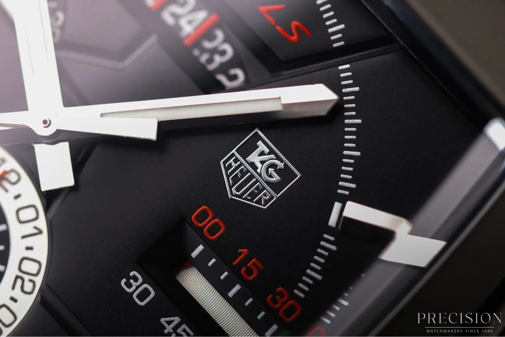 TAG Heuer Monaco LS square case chronograph with black dial and red timing scale accents