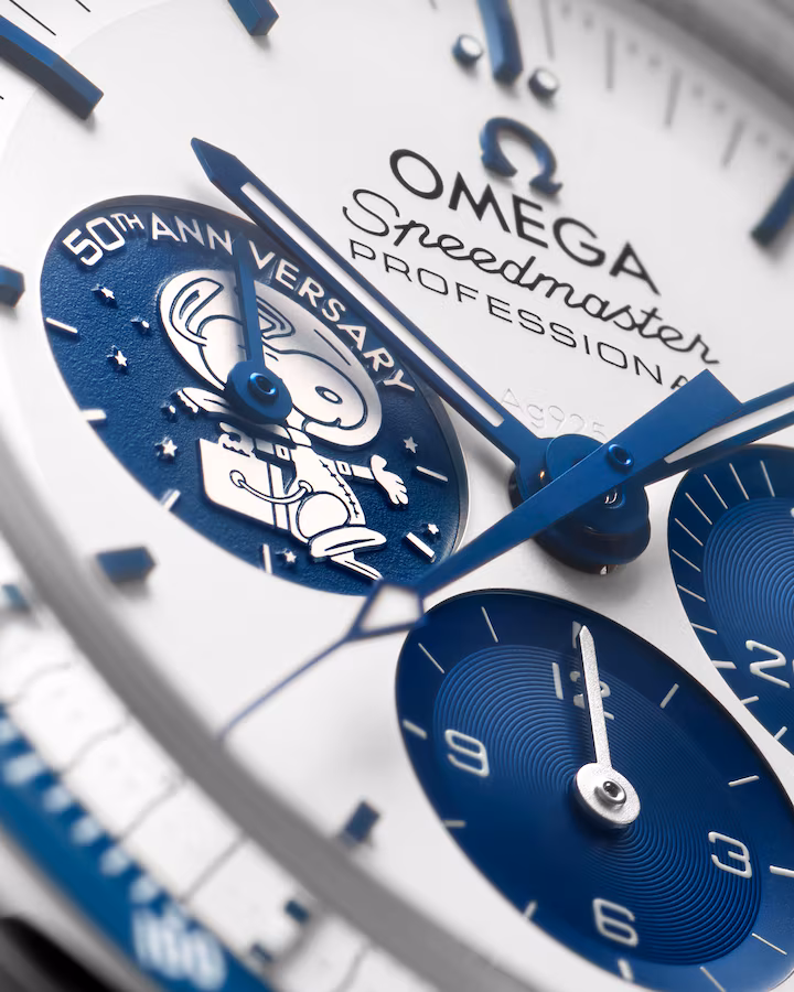 omega speedmaster snoopy dial close up