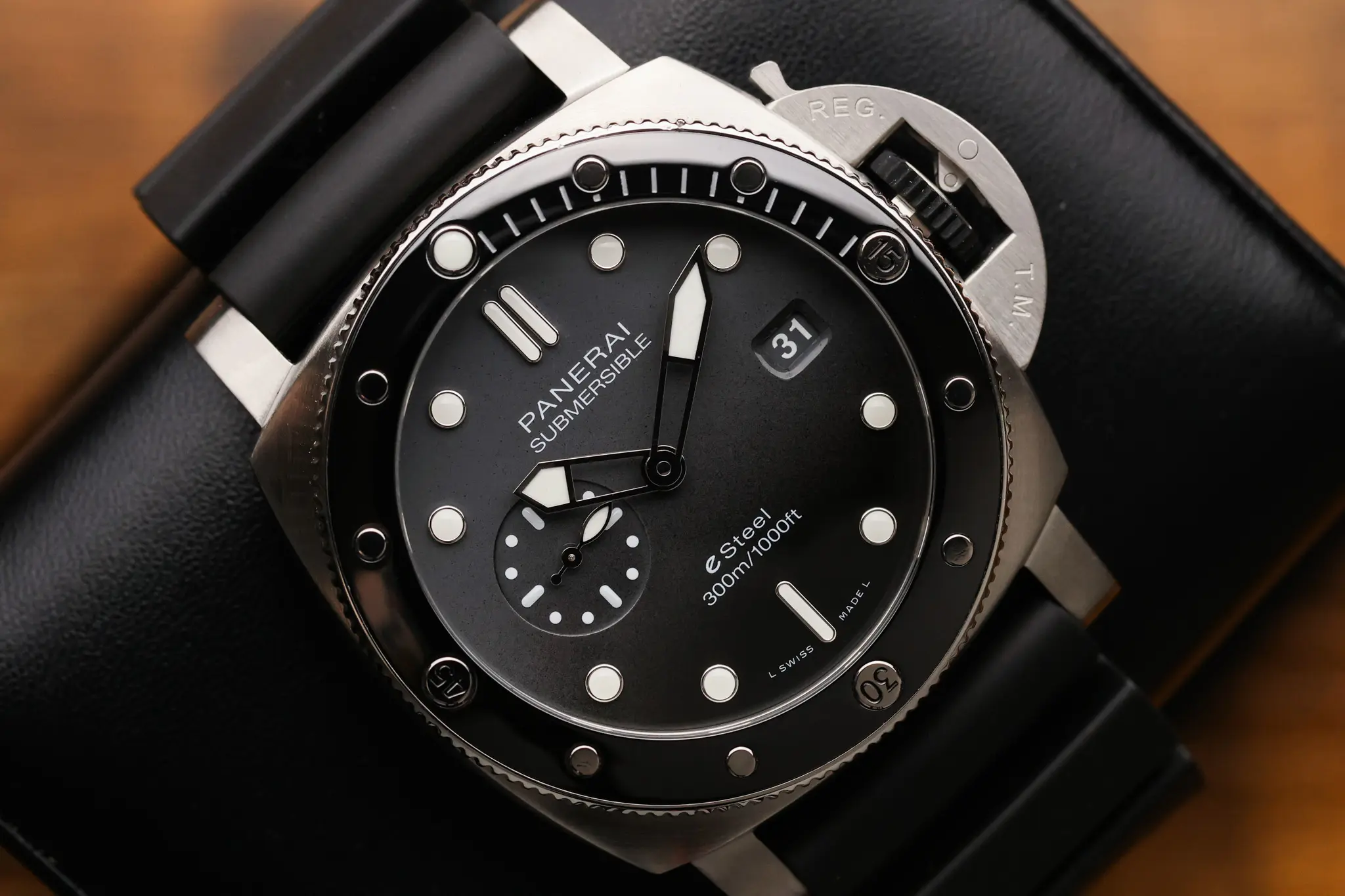 Front angled view of Panerai Submersible QuarantaQuattro Grigio Roccia PAM01288 showing black strap and dark gray dial