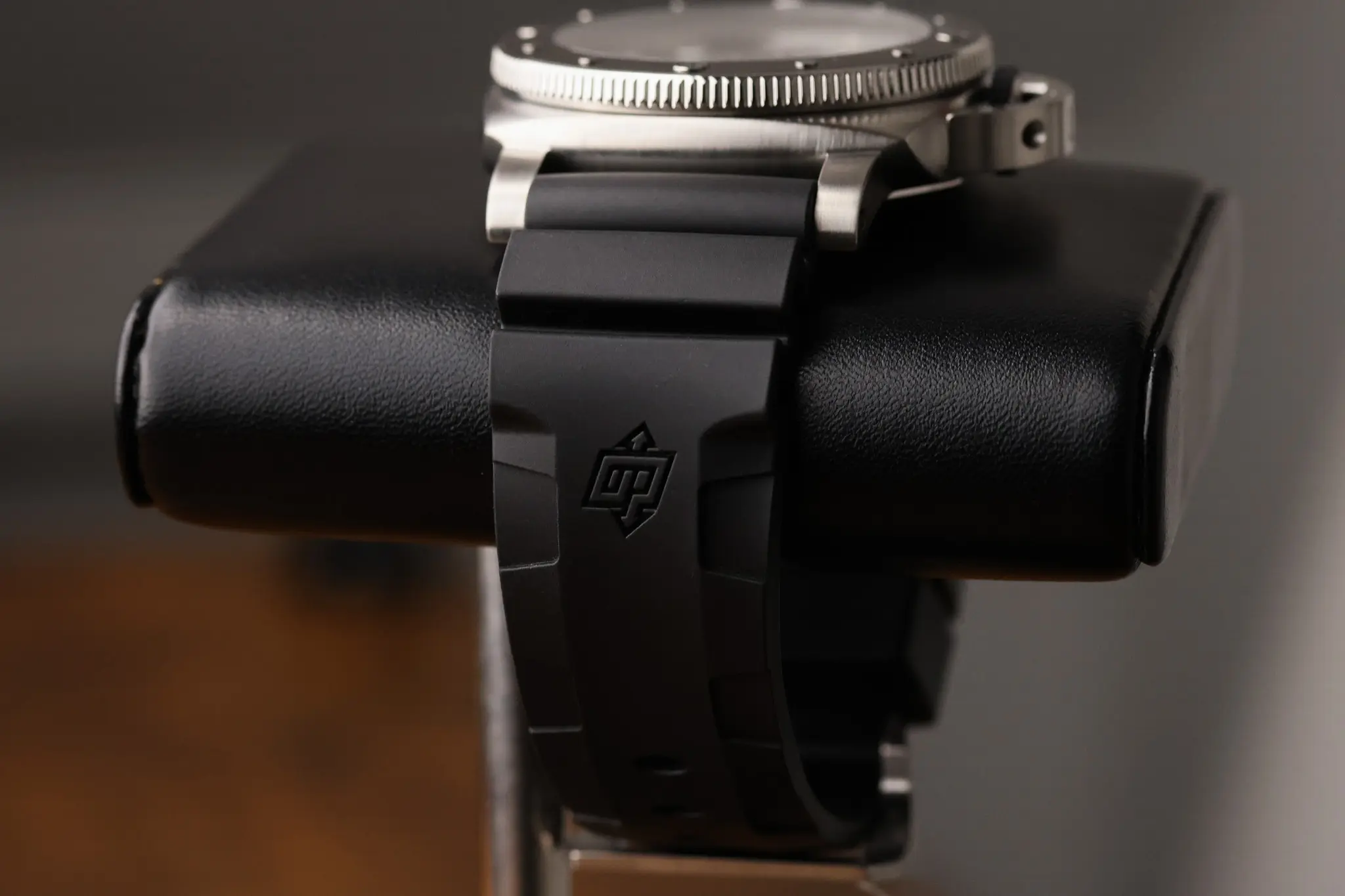 Panerai Submersible QuarantaQuattro black strap and buckle displayed on stand