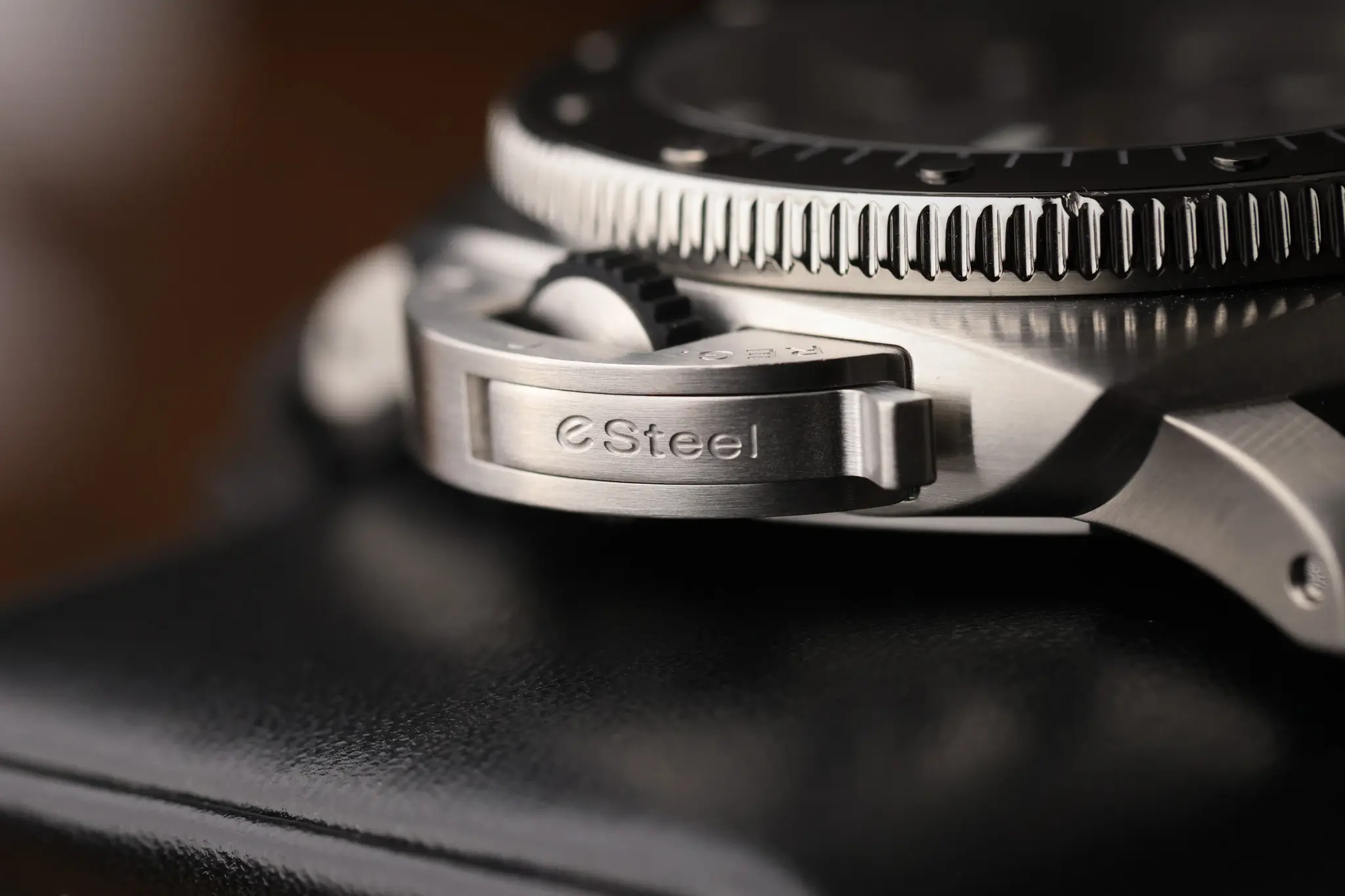 Side profile of Panerai Submersible QuarantaQuattro showing brushed case, rotating bezel, and crown guard lever