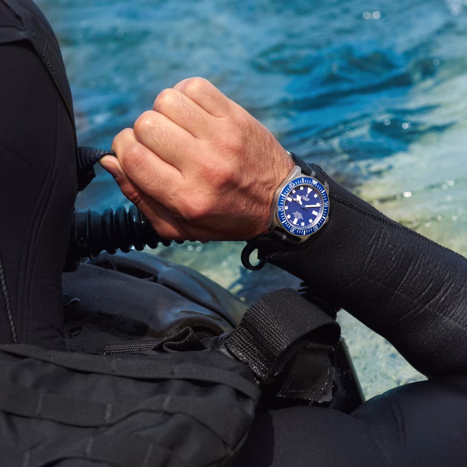 tudor pelagos fxd worn by diver on the wrist