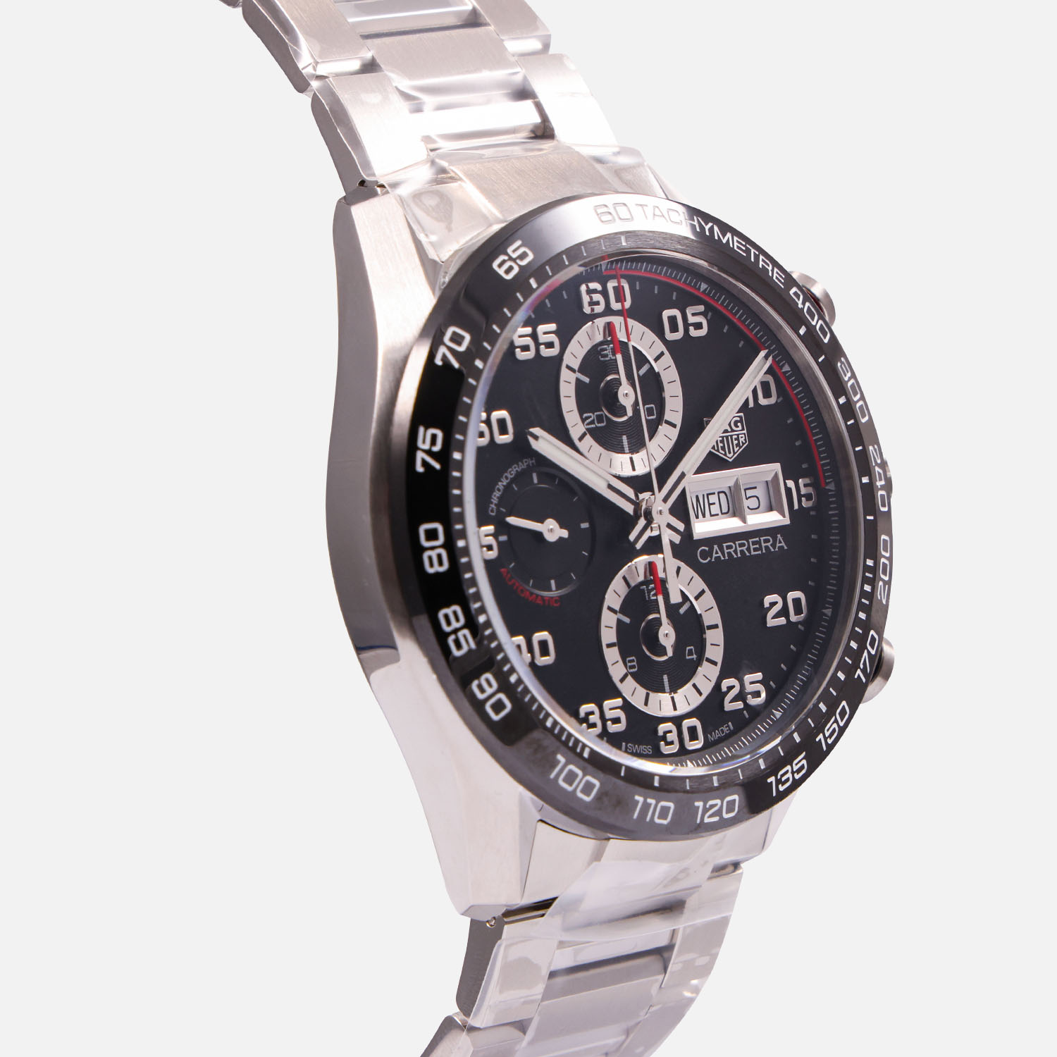 Side view of a pre-owned TAG Heuer Carrera Chronograph 44mm (Ref. CBN2A1AABA0643) in stainless steel featuring a black dial with triple chronograph registers, day-date window, and a steel bracelet.