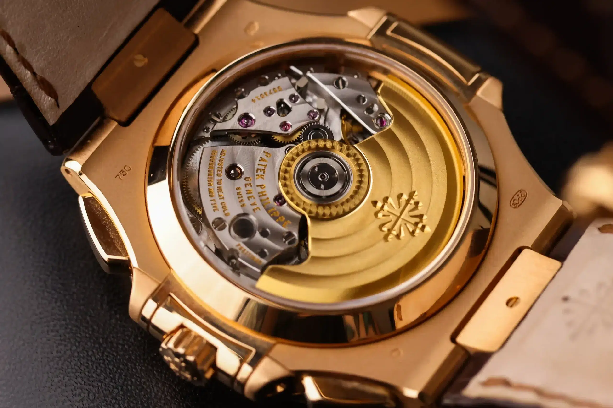 Caseback detail of the Patek Philippe Nautilus Chronograph 5980R-001 showing the movement through the sapphire display back