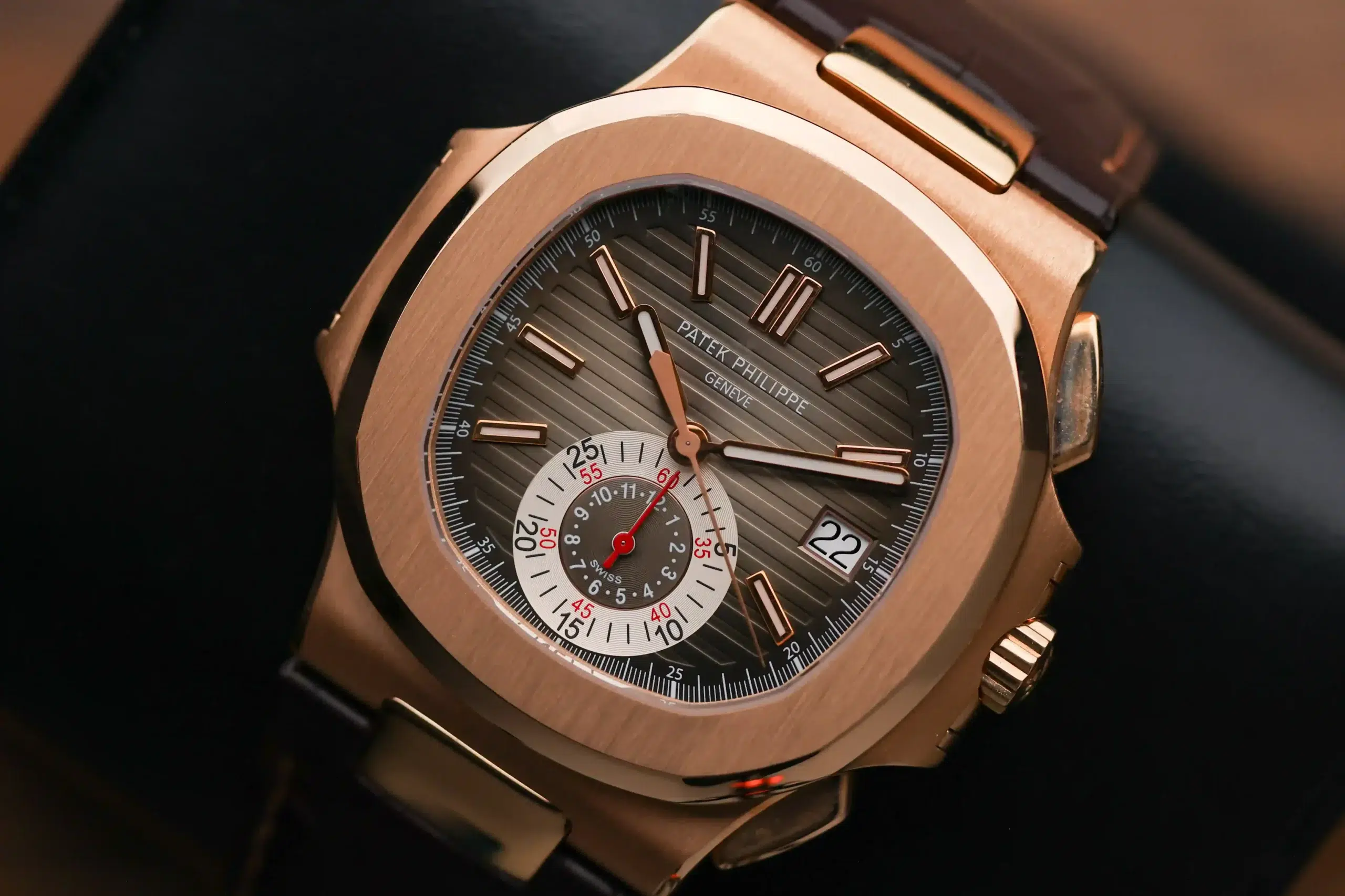 Front view of the Patek Philippe Nautilus Chronograph 5980R-001 in rose gold with brown dial and brown leather strap