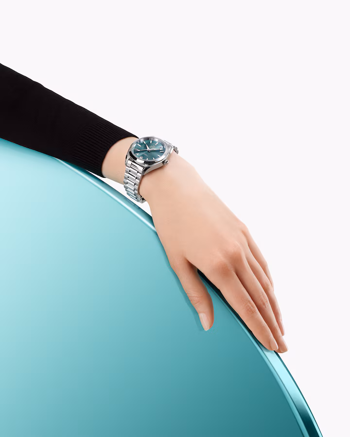 Omega aqua terra on the wrist lagoon green