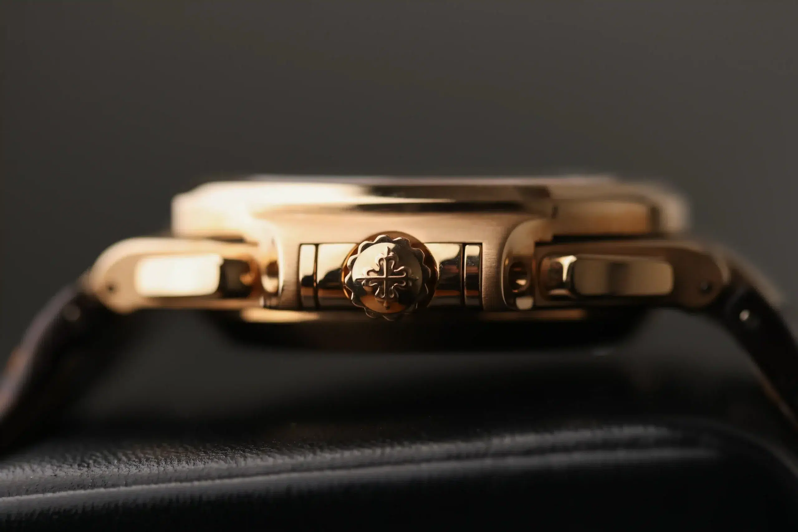 Side profile of the Patek Philippe Nautilus Chronograph 5980R-001 in rose gold showing the case thickness and crown