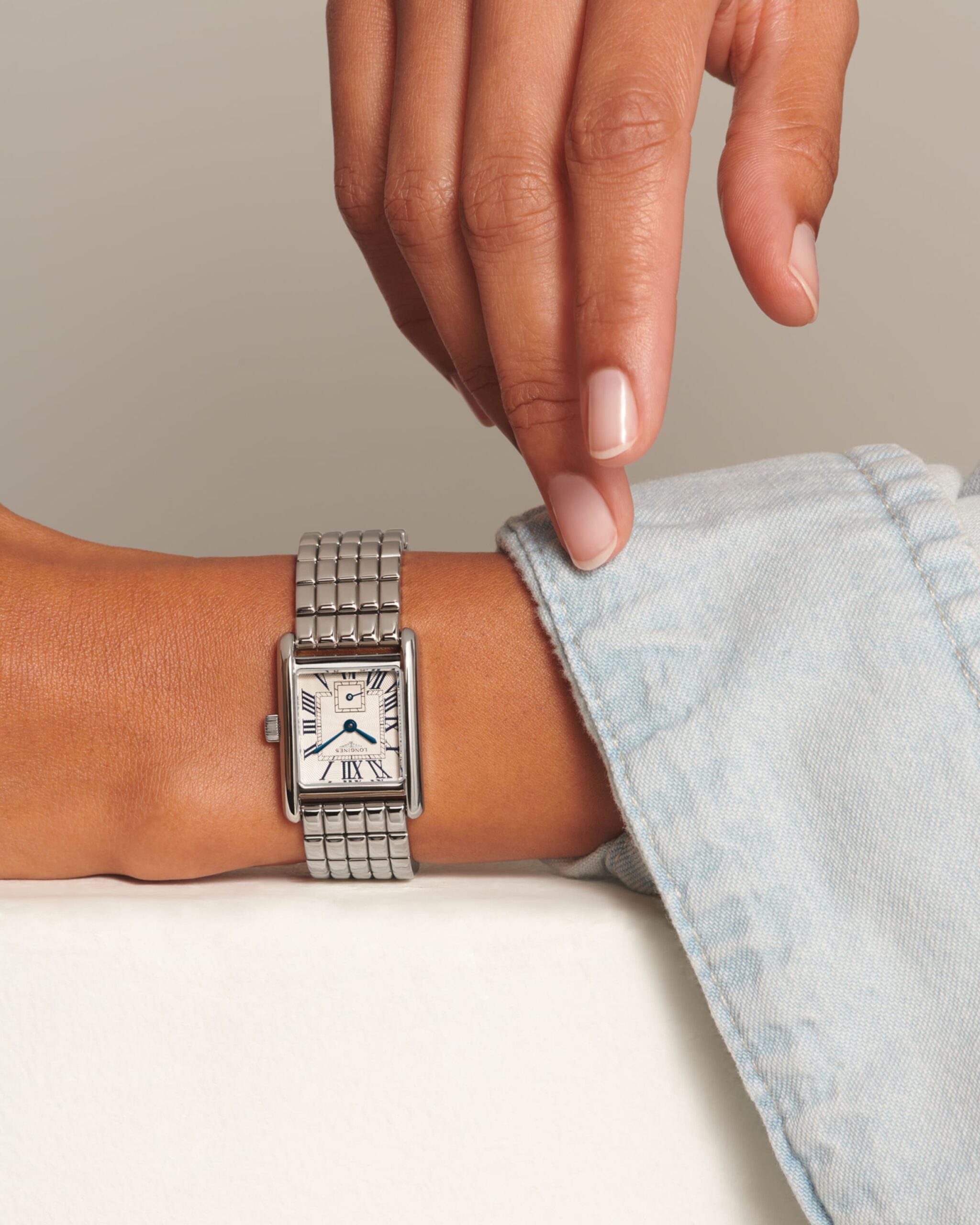 longines mini dolcevita worn on the wrist