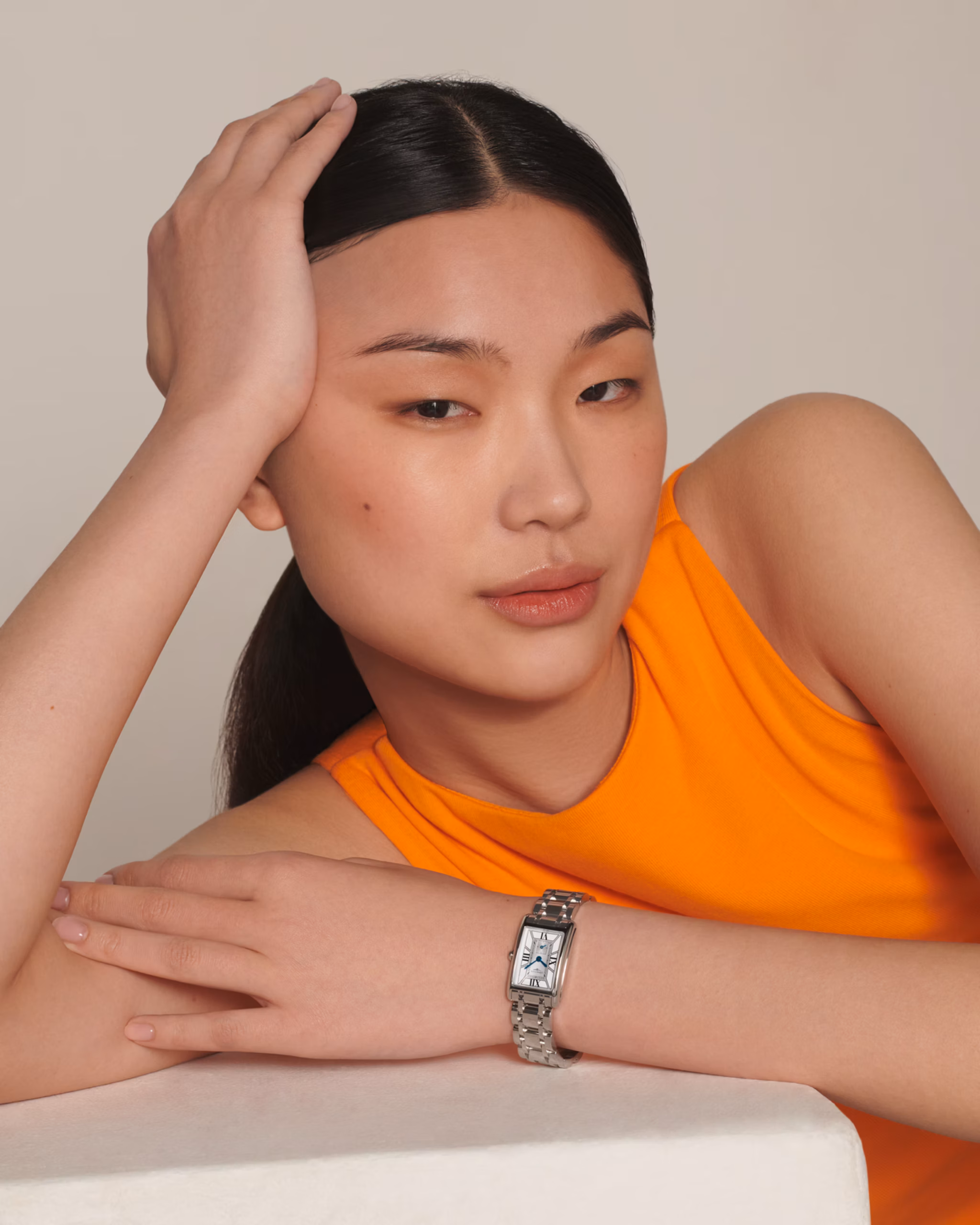woman posing with longines dolcevita
