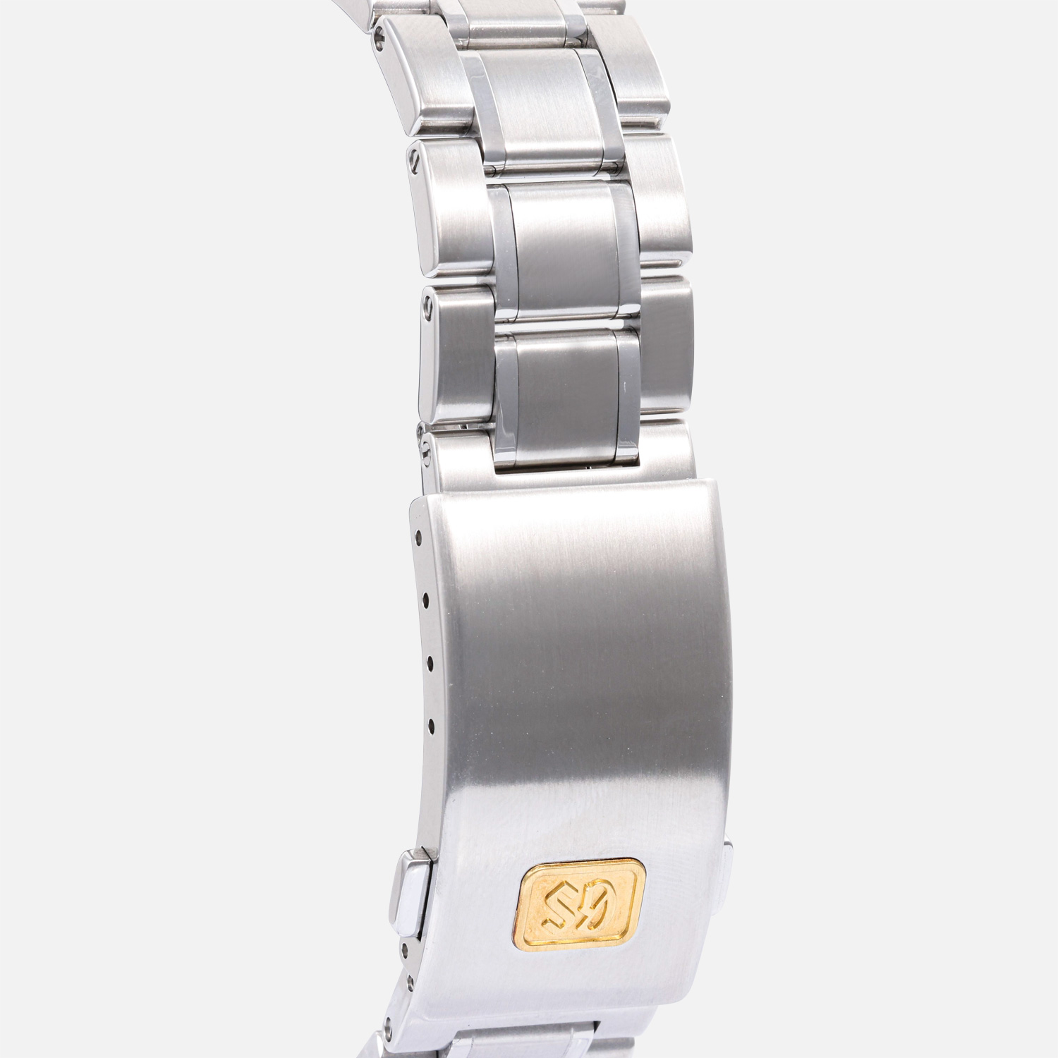 buckle view of a pre-owned Grand Seiko Sport Collection Spring Drive GMT 44mm (Ref. SBGE248) in stainless steel, highlighting its 18k yellow gold rotating bezel with a blue sapphire crystal insert, deep blue sunray dial with gold-plated accents, and a stainless steel bracelet.
