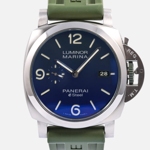 Front view of a pre-owned Panerai Luminor Marina eSteel Verde Smeraldo 44mm (Ref. PAM01356) in eSteel, displaying its polished emerald green gradient sandwich dial, small seconds at 9 o'clock, date at 3 o'clock, trademark crown guard, and military green recycled PET fabric strap.