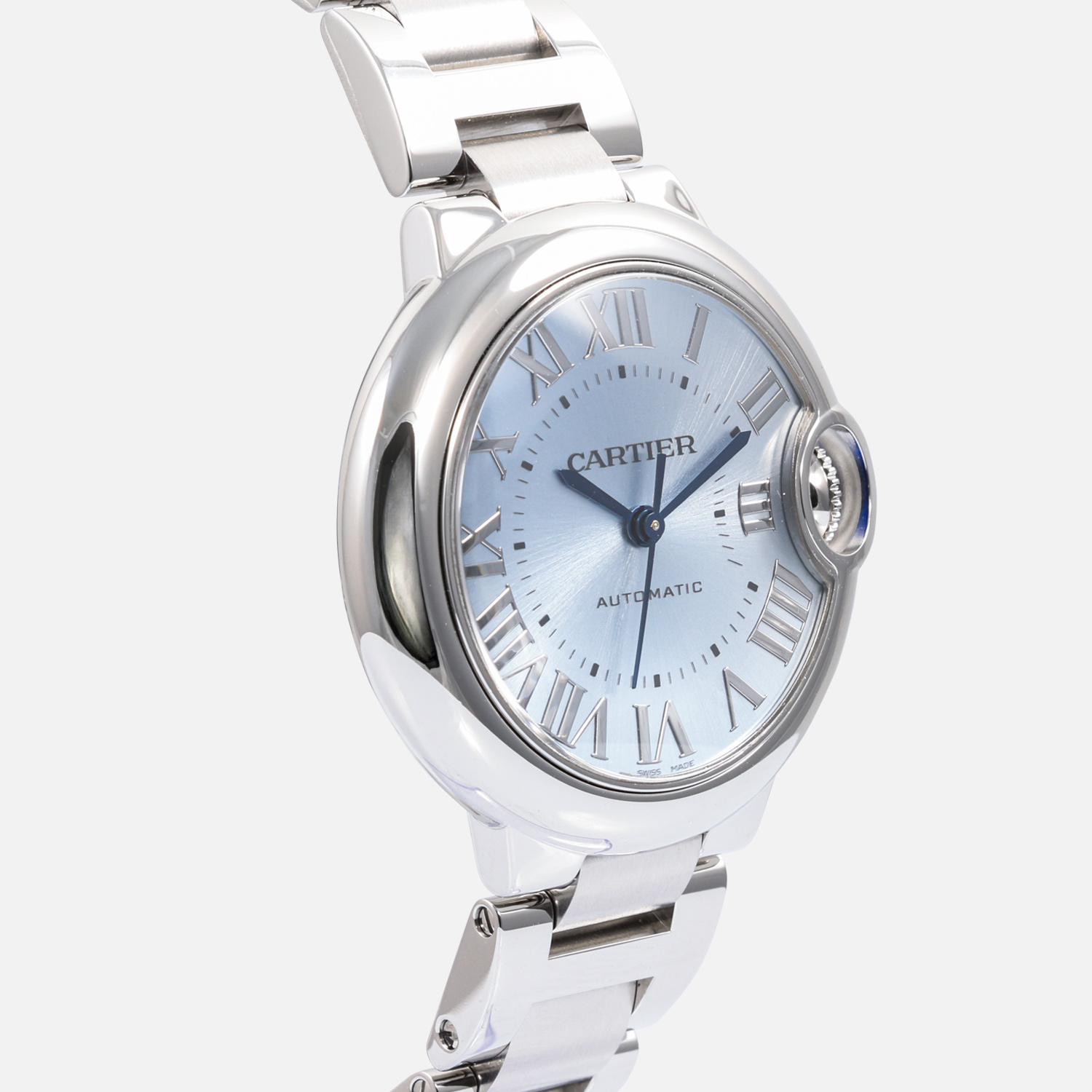 Side profile of the Cartier Ballon Bleu 33mm steel case showing the domed sapphire crystal and steel bracelet