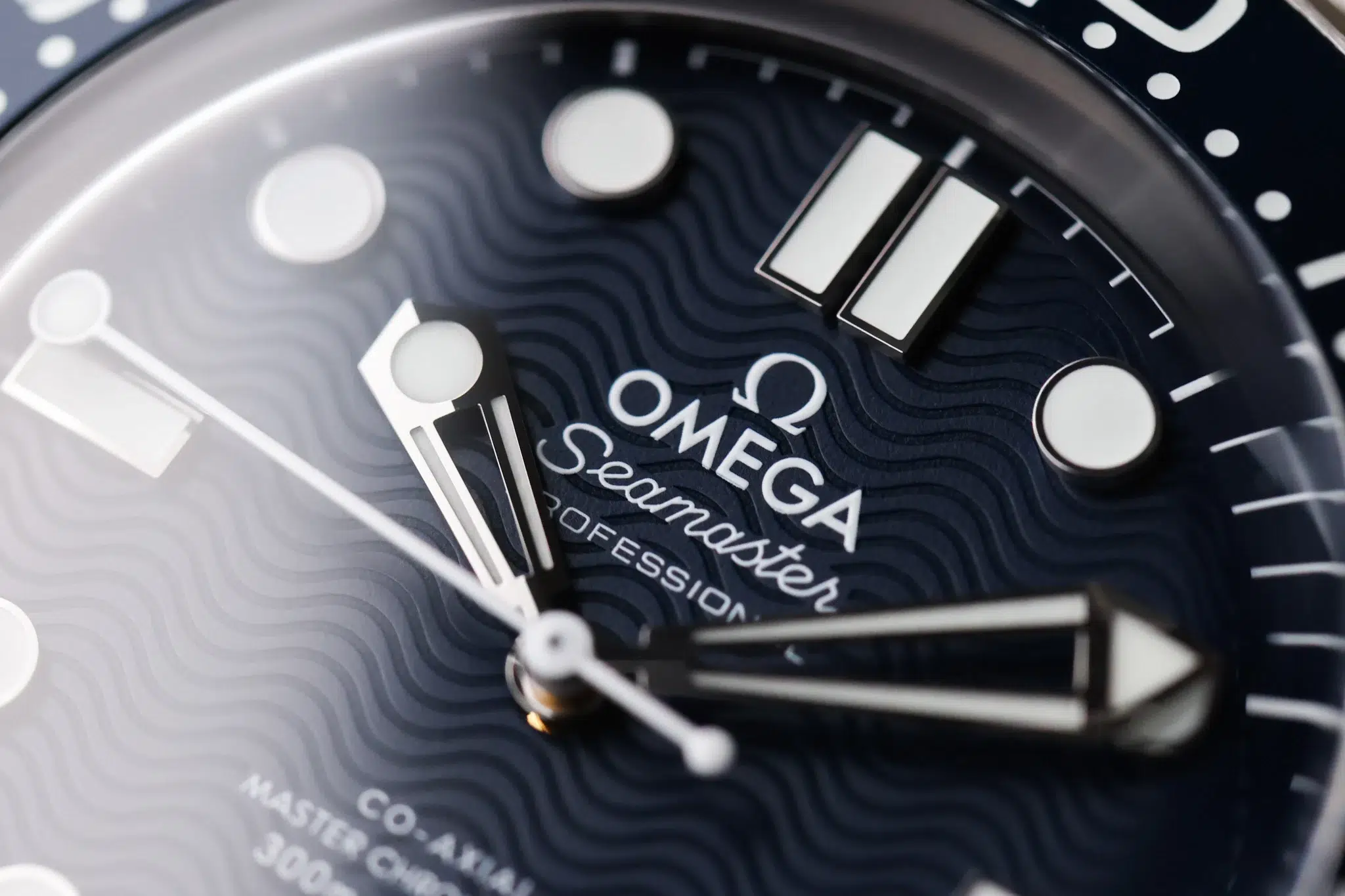 Close-up of Omega Seamaster James Bond 60th Anniversary blue wave dial and hands