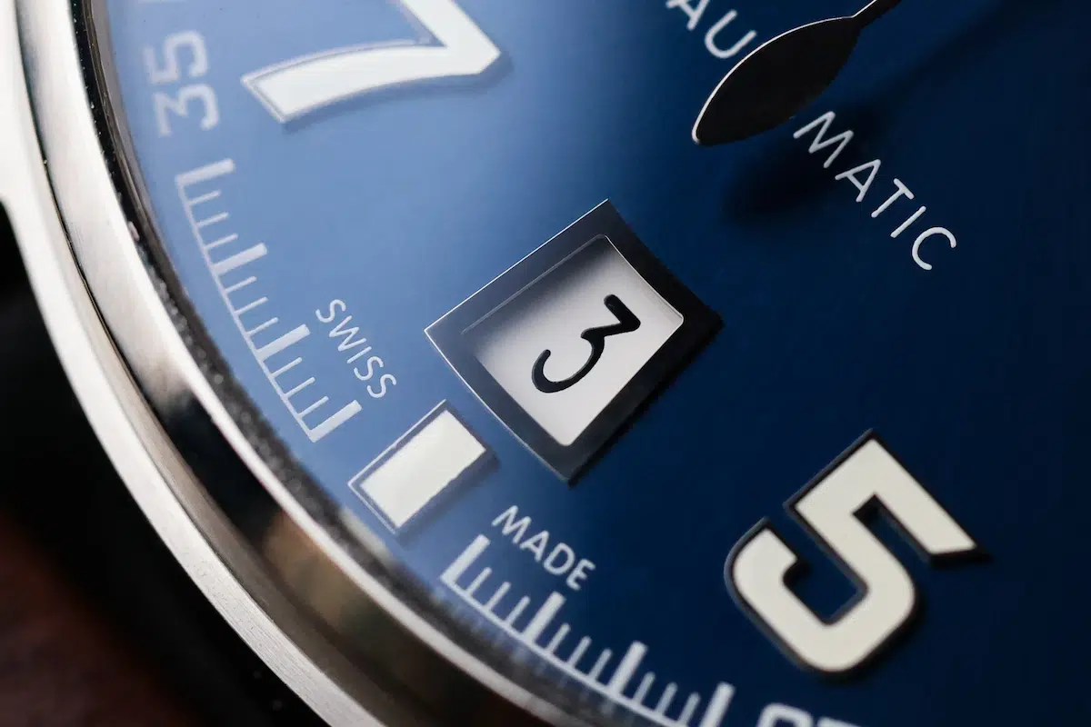 Date window and minute track detail on the IWC Big Pilot Le Petit Prince blue dial