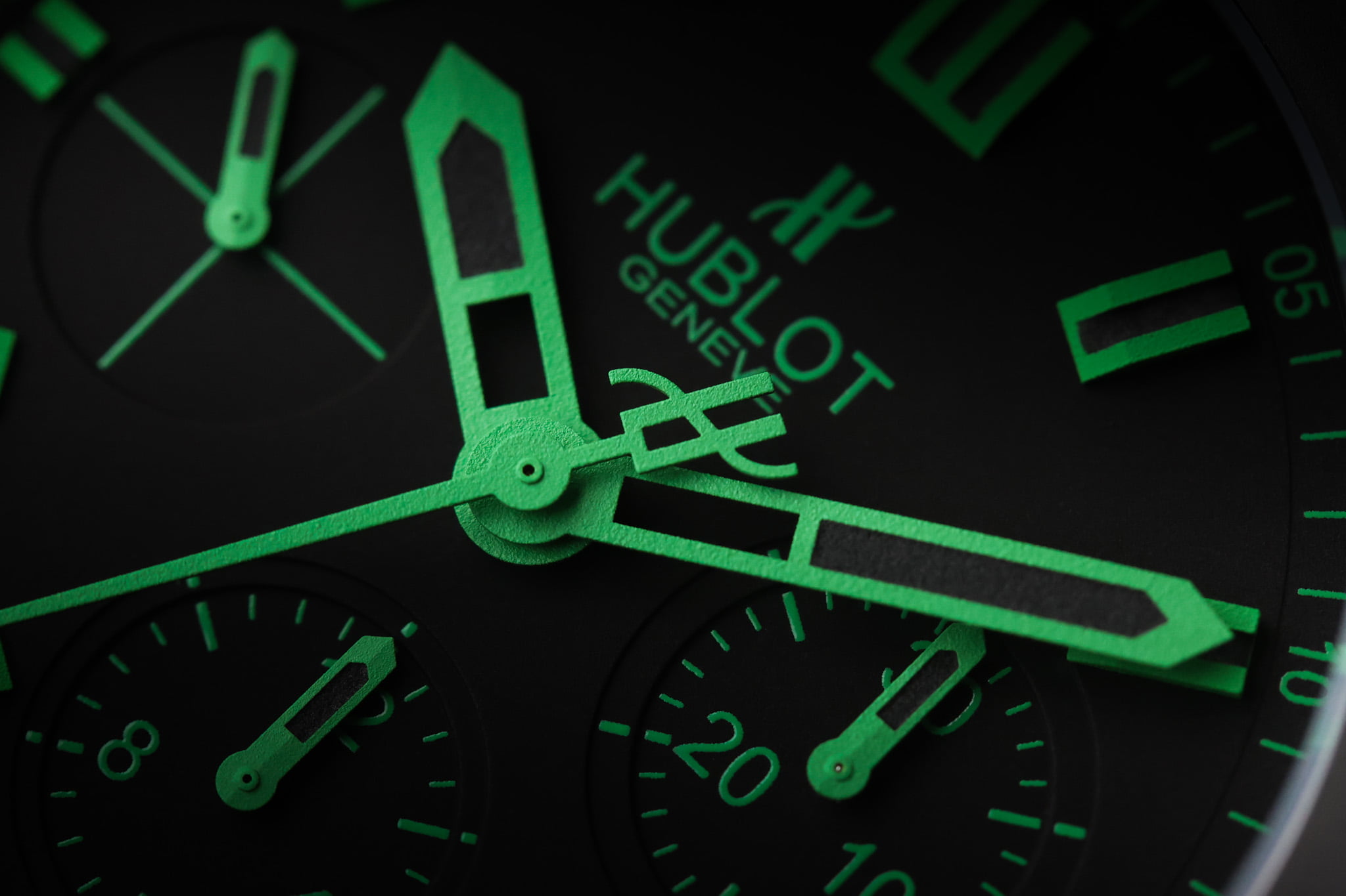 Hublot Big Bang All Black Green close-up showing green luminous hands and chronograph subdials