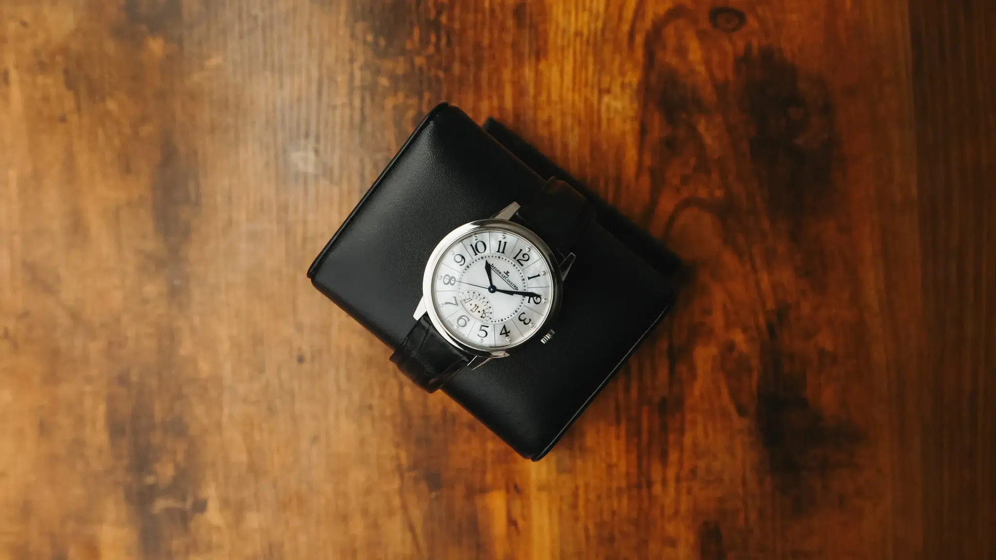 Jaeger LeCoultre Rendez Vous Date Q3548490 on wooden surface