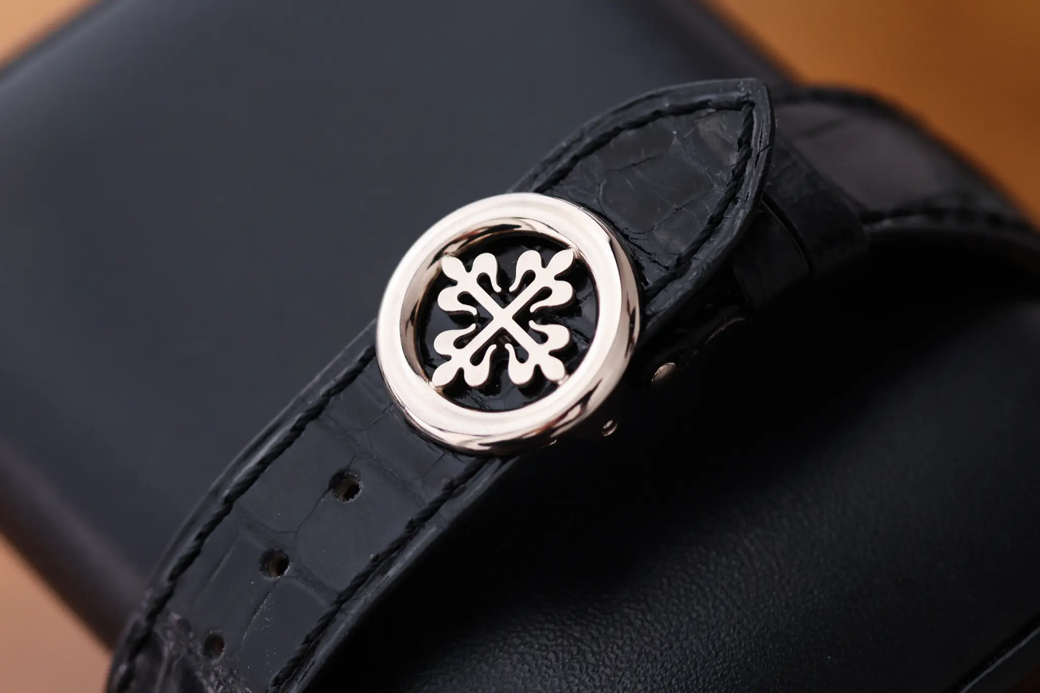 Patek Philippe Calatrava cross logo on black leather strap
